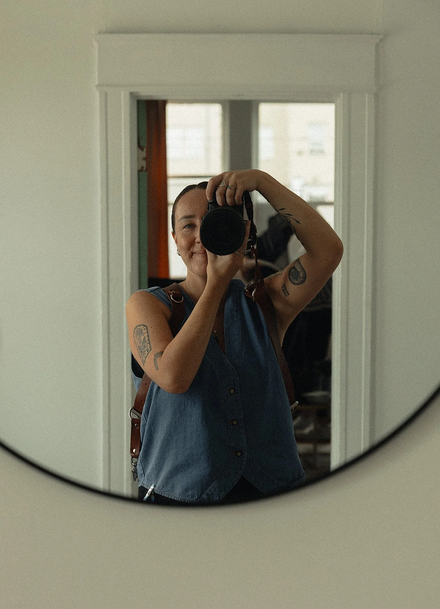 Corrie Mahr, wedding and elopement photographer, outdoors with her camera
